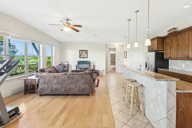 1204 Ogden Dr, Austin, TX 78733 - living room featuring ceiling fan, light wood-style flooring, and recessed lighting