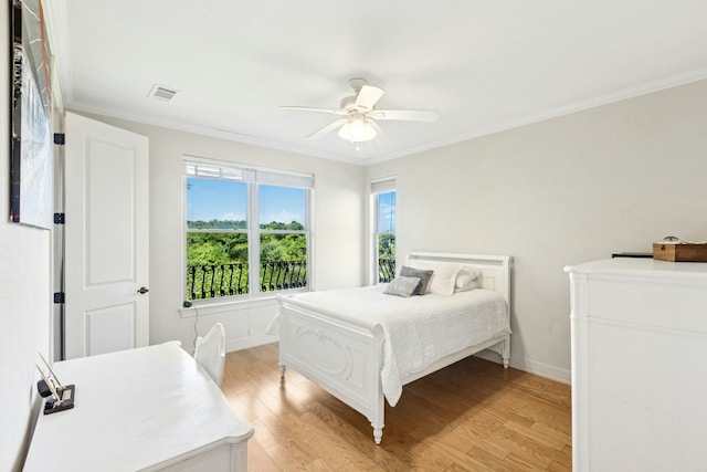 1204 Ogden Dr, Austin, TX 78733 - bedroom with ornamental molding, light wood finished floors, and ceiling fan