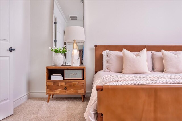 15 Chandon Ln, Lakeway, TX 78734 - bedroom with carpet, baseboards, and ornamental molding