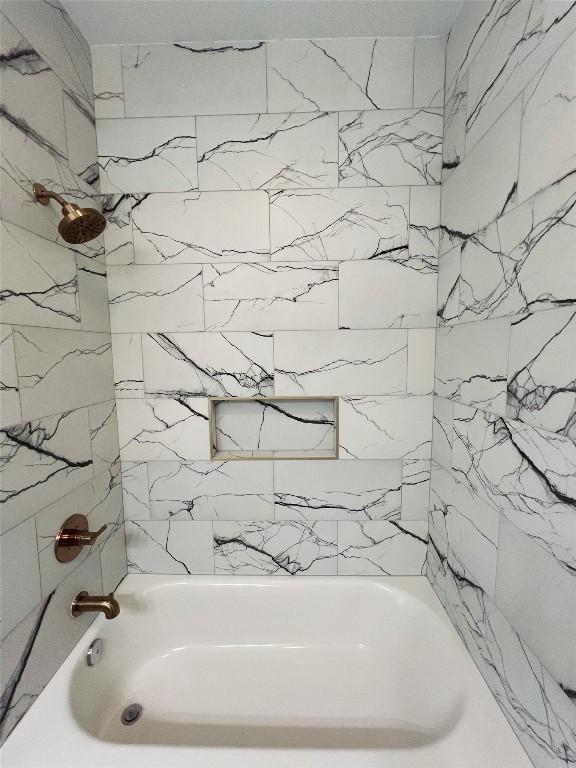 full bathroom with shower / bathing tub combination