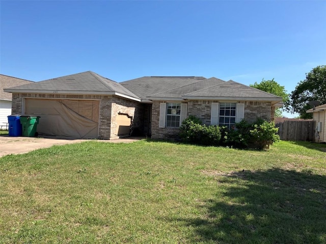 single story home featuring concrete driveway, a front lawn, an attached garage, fence, and brick siding
