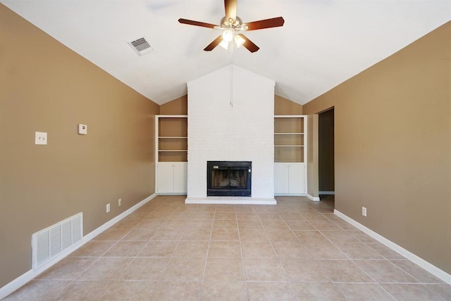 8142 Ceberry Dr Unit B, Austin, TX 78759 - unfurnished living room featuring built in features, a ceiling fan, a brick fireplace, baseboards, and light tile patterned floors