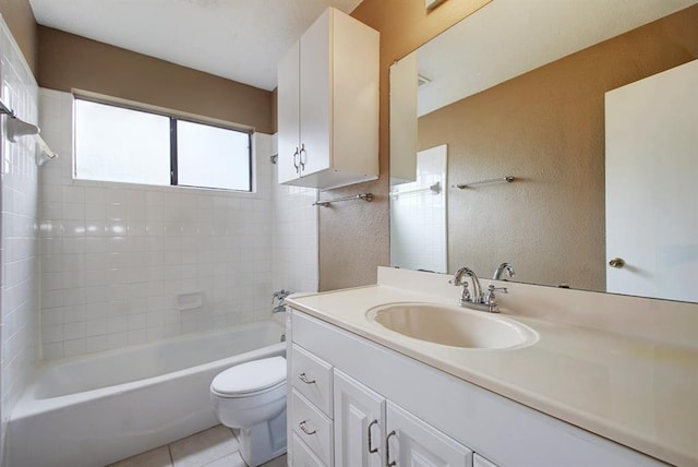 8142 Ceberry Dr Unit B, Austin, TX 78759 - bathroom with toilet, vanity, shower / washtub combination, a textured wall, and tile patterned floors