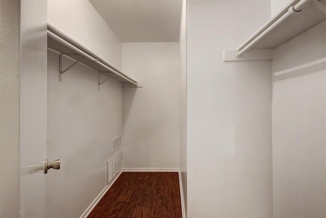 8142 Ceberry Dr Unit B, Austin, TX 78759 - spacious closet with dark wood-type flooring