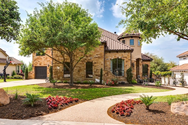 2104 University Club Dr, Austin, TX 78732 - mediterranean / spanish home with driveway, an attached garage, stone siding, a tile roof, and a front yard