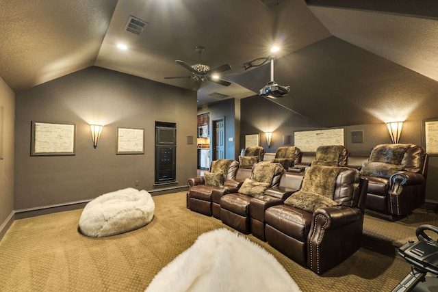 2104 University Club Dr, Austin, TX 78732 - carpeted cinema room with vaulted ceiling, baseboards, a ceiling fan, recessed lighting, and a textured ceiling