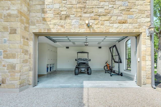 2104 University Club Dr, Austin, TX 78732 - garage featuring a garage door opener