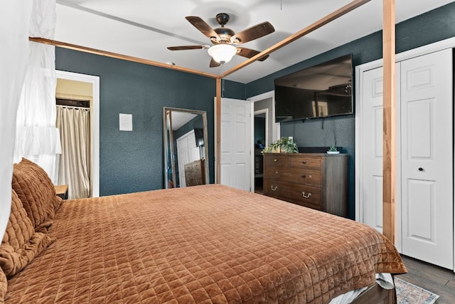 26 N Castleberry St, Lampasas, TX 76550 - bedroom with wood finished floors, a ceiling fan, and a textured wall