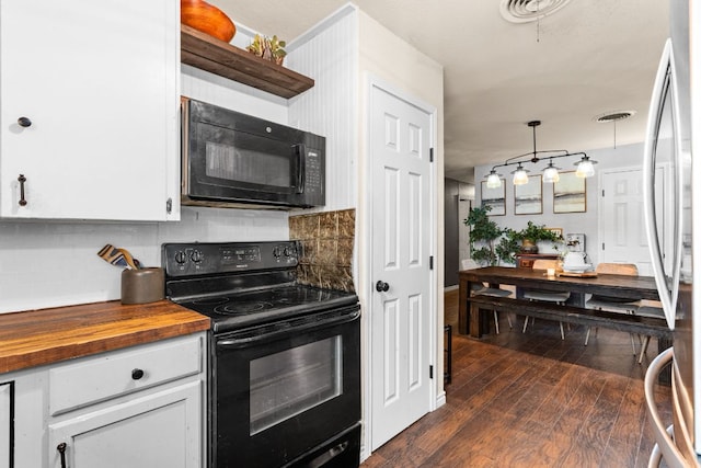 26 N Castleberry St, Lampasas, TX 76550 - kitchen with black appliances, dark wood-style flooring, decorative backsplash, white cabinets, and wooden counters
