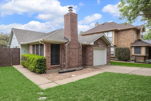view of front of house featuring a chimney, roof with shingles, concrete driveway, brick siding, and a front yard