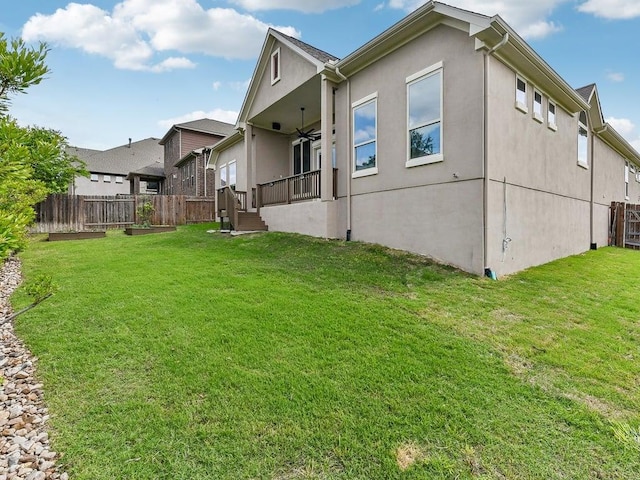 6120 Gunnison Turn Rd, Austin, TX 78738 - view of side of property featuring ceiling fan and stucco siding