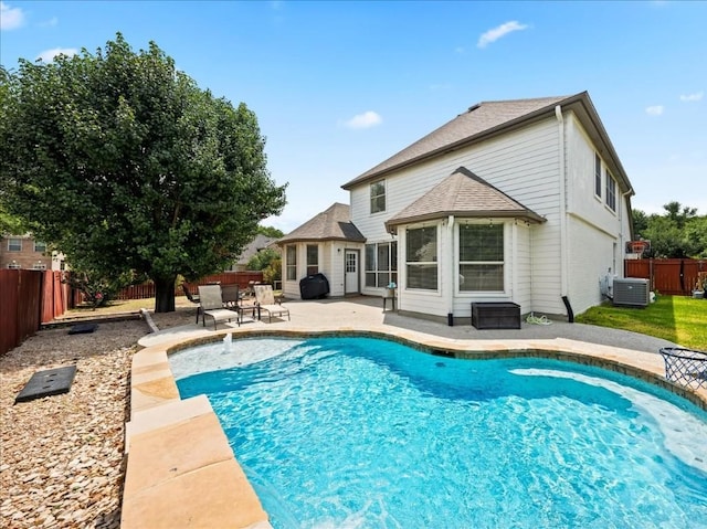 134 Brentwood Dr, Georgetown, TX 78628 - view of swimming pool featuring a patio, a fenced backyard, and central AC