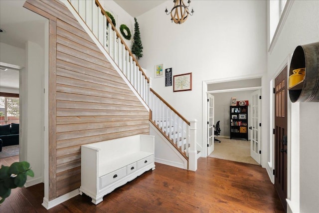 134 Brentwood Dr, Georgetown, TX 78628 - foyer featuring stairway, a high ceiling, dark wood-style flooring, and baseboards