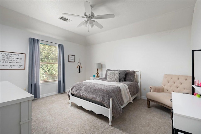 134 Brentwood Dr, Georgetown, TX 78628 - bedroom with light colored carpet, baseboards, and a ceiling fan