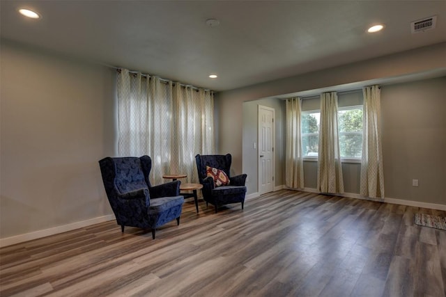 417 Big Bow, Smithville, TX 78957 - sitting room with baseboards and wood finished floors