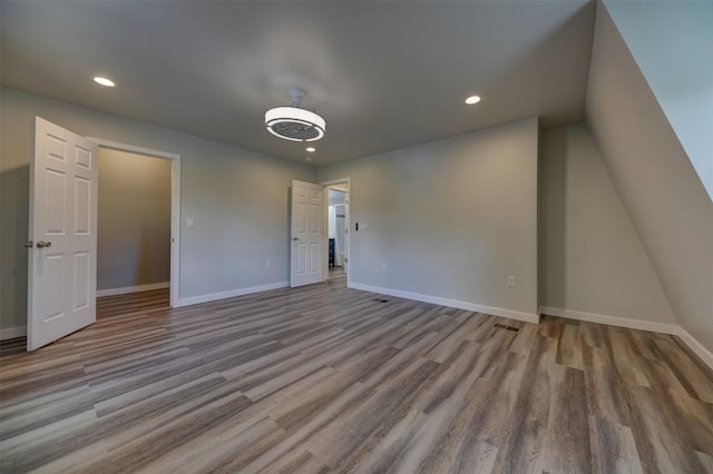 417 Big Bow, Smithville, TX 78957 - interior space featuring baseboards, wood finished floors, and recessed lighting