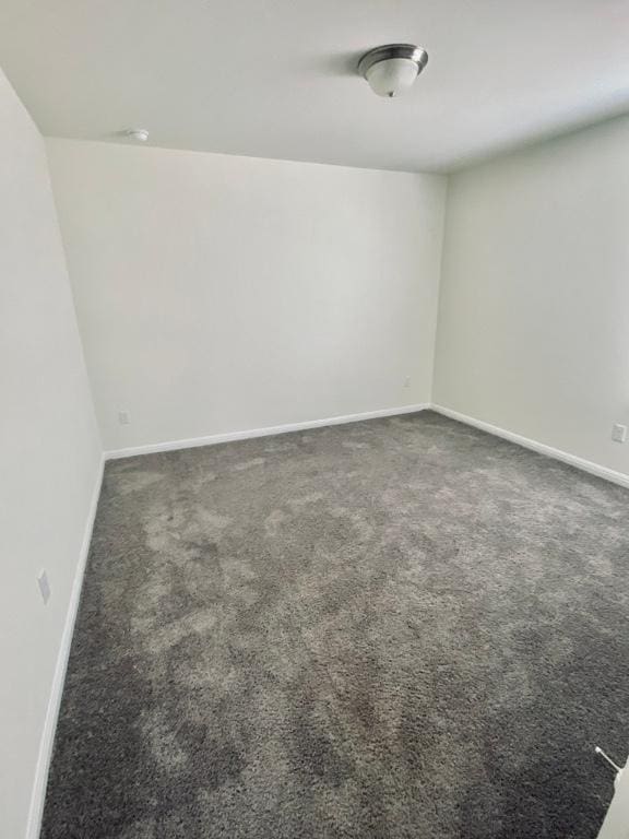 265 Spanish Star Trl, Dripping Springs, TX 78620 - carpeted empty room with baseboards