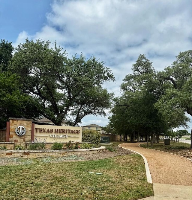 265 Spanish Star Trl, Dripping Springs, TX 78620 - community sign with a yard