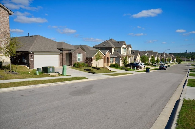 2504 Indian Clover Trl, Leander, TX 78641 - view of asphalt street featuring a residential view, sidewalks, curbs, and street lighting