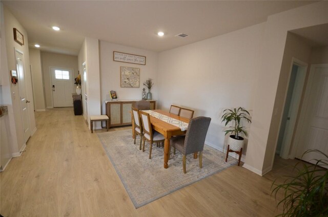 2504 Indian Clover Trl, Leander, TX 78641 - dining room featuring light wood-style flooring, baseboards, and recessed lighting