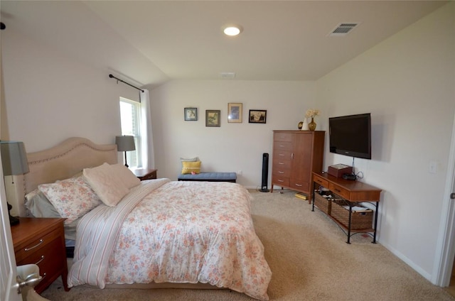 2504 Indian Clover Trl, Leander, TX 78641 - bedroom featuring light carpet, vaulted ceiling, and baseboards