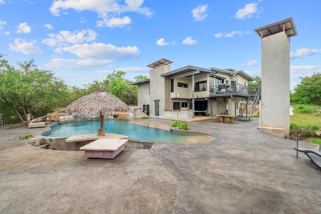 outdoor pool with a patio