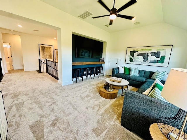 1603 Headwaters Blvd, Dripping Springs, TX 78620 - living area featuring a ceiling fan, carpet, baseboards, lofted ceiling, and visible vents