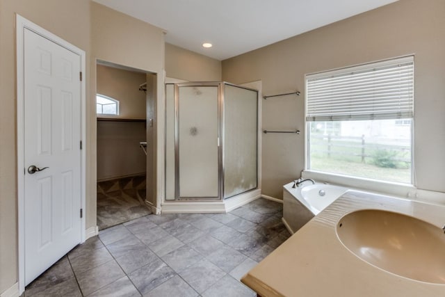 208 Saddletree Ln, Dripping Springs, TX 78620 - full bath with a sink, a stall shower, and healthy amount of natural light