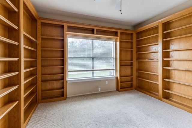 208 Saddletree Ln, Dripping Springs, TX 78620 - carpeted empty room featuring a ceiling fan and baseboards