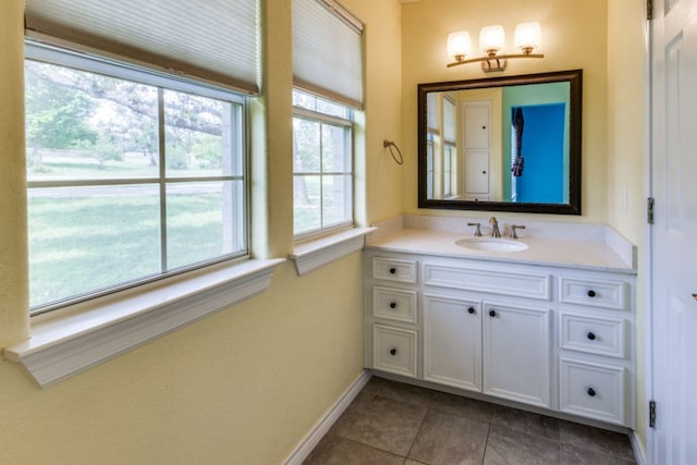 208 Saddletree Ln, Dripping Springs, TX 78620 - bathroom featuring tile patterned flooring, vanity, and baseboards