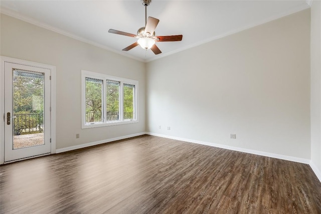 5004 Arrowhead Dr, Lago Vista, TX 78645 - empty room featuring plenty of natural light, dark wood-style flooring, crown molding, and baseboards