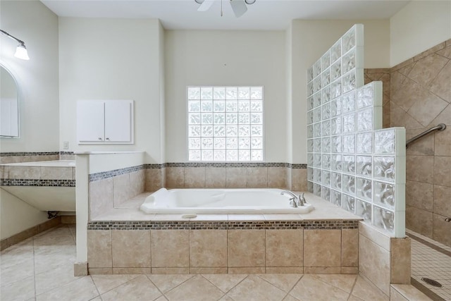 5004 Arrowhead Dr, Lago Vista, TX 78645 - full bathroom featuring a garden tub, tile patterned flooring, and walk in shower