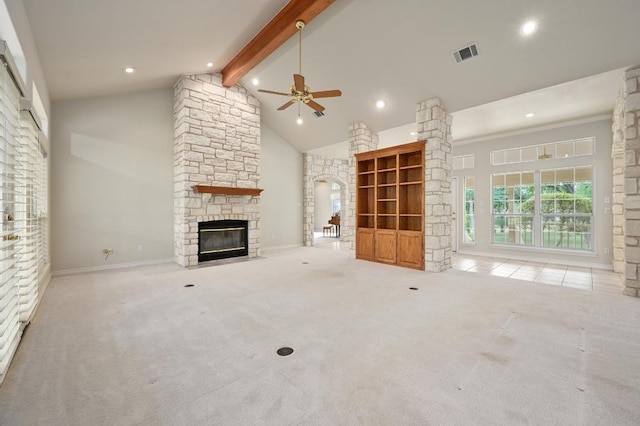 unfurnished living room with visible vents, recessed lighting, beamed ceiling, a ceiling fan, and a stone fireplace