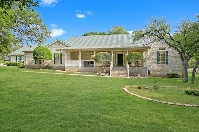 ranch-style house featuring stone siding, a front lawn, and covered porch