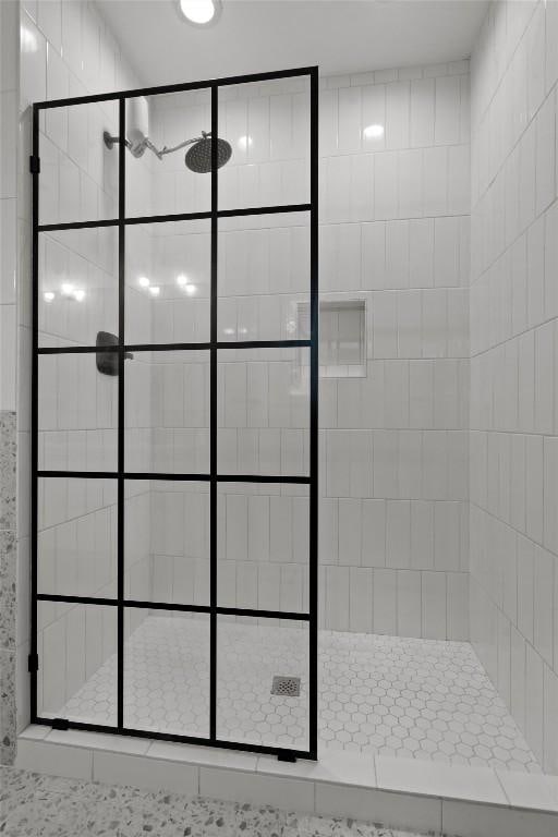 bathroom featuring a stall shower