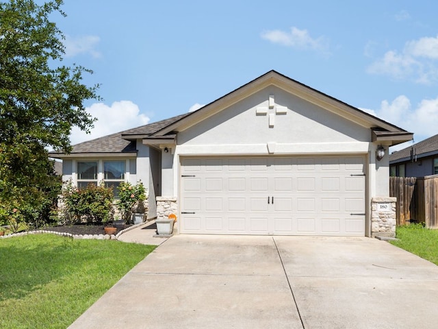 180 Tailwind Dr, Kyle, TX 78640 - single story home with stone siding, an attached garage, concrete driveway, stucco siding, and roof with shingles