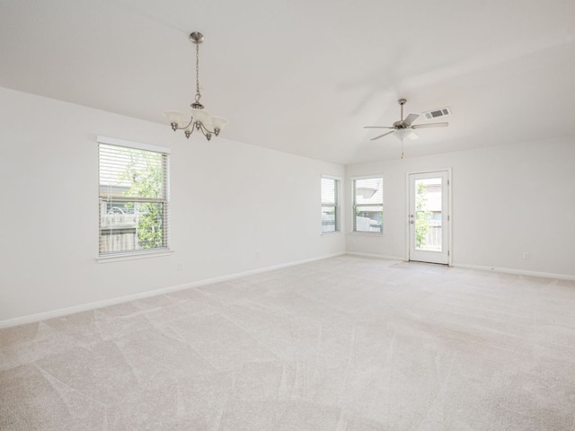 180 Tailwind Dr, Kyle, TX 78640 - spare room with a chandelier, healthy amount of natural light, light colored carpet, and lofted ceiling