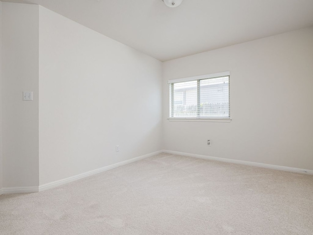180 Tailwind Dr, Kyle, TX 78640 - empty room with light carpet and baseboards