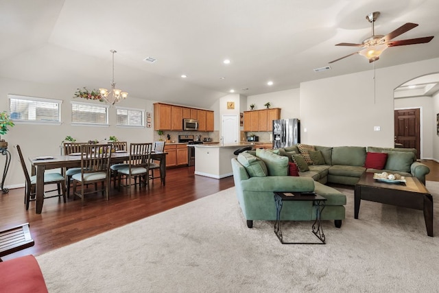 535 Tranquility Mtn, Buda, TX 78610 - living area featuring a chandelier, arched walkways, lofted ceiling, dark wood-style floors, and ceiling fan
