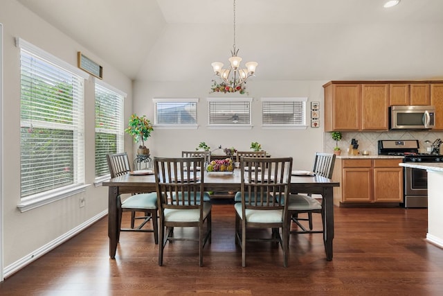 535 Tranquility Mtn, Buda, TX 78610 - dining space with plenty of natural light, vaulted ceiling, dark wood-style floors, and a chandelier