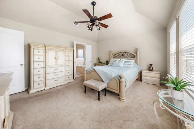 535 Tranquility Mtn, Buda, TX 78610 - bedroom featuring lofted ceiling, light carpet, a ceiling fan, and connected bathroom