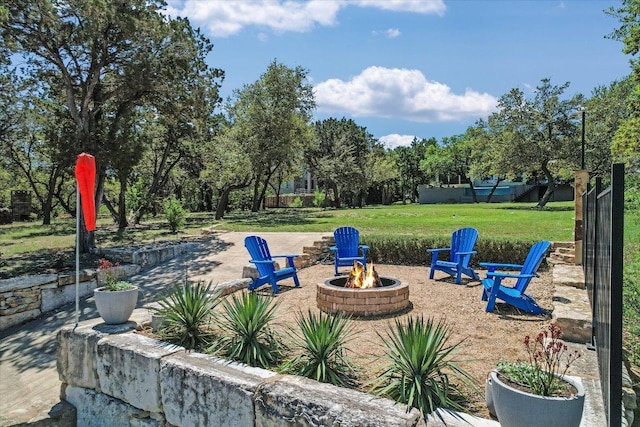 5711 Pool Canyon Cv, Austin, TX 78734 - view of patio with an outdoor fire pit