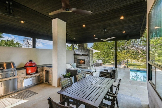5711 Pool Canyon Cv, Austin, TX 78734 - view of patio featuring an outdoor stone fireplace, an outdoor pool, a ceiling fan, and outdoor dining space