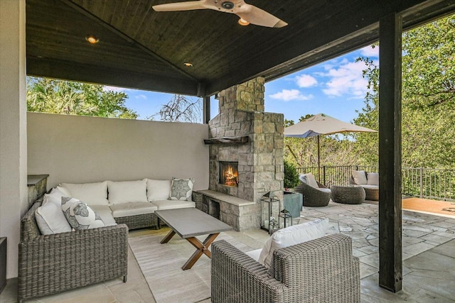 5711 Pool Canyon Cv, Austin, TX 78734 - view of patio with an outdoor living space with a fireplace and ceiling fan