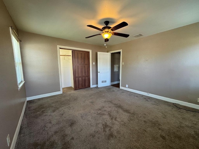 1120 Fisher St, Taylor, TX 76574 - unfurnished bedroom featuring a closet, carpet, and ceiling fan