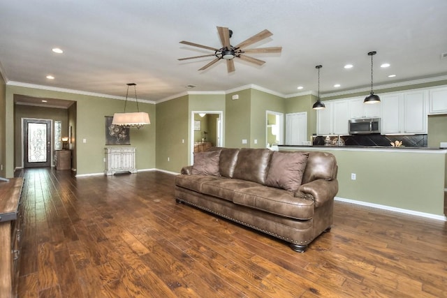 802 Apache Mountain Ln, Georgetown, TX 78633 - living room featuring ceiling fan, recessed lighting, dark wood-style flooring, baseboards, and ornamental molding