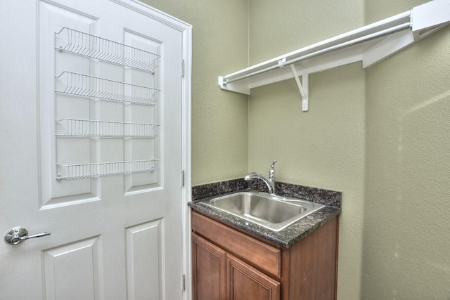 802 Apache Mountain Ln, Georgetown, TX 78633 - washroom featuring a sink and a textured wall