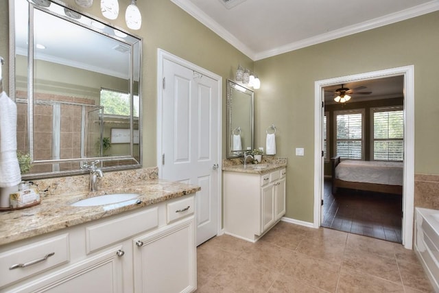 802 Apache Mountain Ln, Georgetown, TX 78633 - full bath featuring crown molding, a shower stall, two vanities, ceiling fan, and tile patterned flooring