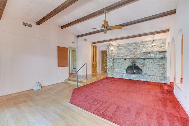 9401 Cedar Crest Dr, Austin, TX 78750 - unfurnished living room featuring ceiling fan, wood finished floors, and a fireplace