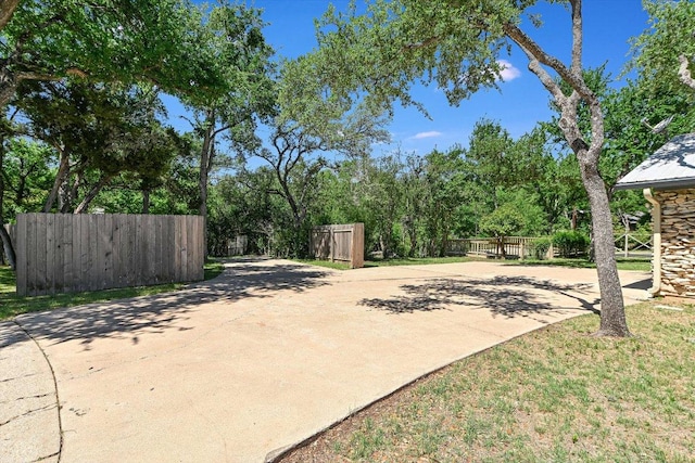 9401 Cedar Crest Dr, Austin, TX 78750 - view of patio featuring driveway